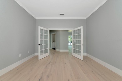 **BRILLIANTLY UPDATED, MOVE-IN READY, GOLF COURSE ESTATE in the on The Oaks Club in Florida - for sale on GolfHomes.com, golf home, golf lot