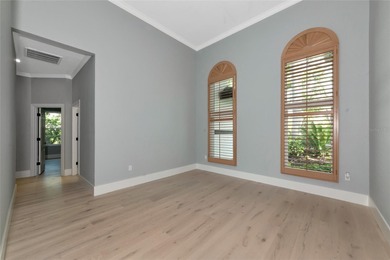**BRILLIANTLY UPDATED, MOVE-IN READY, GOLF COURSE ESTATE in the on The Oaks Club in Florida - for sale on GolfHomes.com, golf home, golf lot