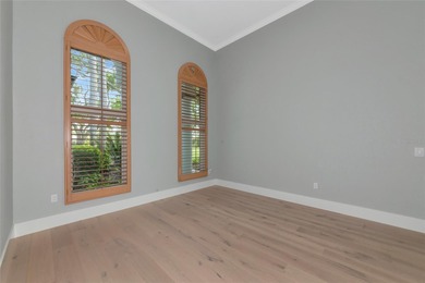 **BRILLIANTLY UPDATED, MOVE-IN READY, GOLF COURSE ESTATE in the on The Oaks Club in Florida - for sale on GolfHomes.com, golf home, golf lot