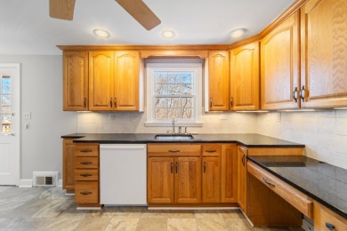 Nestled in a peaceful neighborhood, this beautiful 4-bedroom on Rockledge Golf Club in Connecticut - for sale on GolfHomes.com, golf home, golf lot