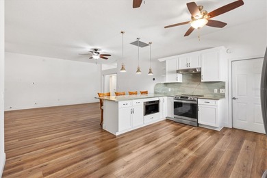 Perfectly positioned on the 3rd green of the Mera Mesa Golf on El Diablo Executive Golf Course in Florida - for sale on GolfHomes.com, golf home, golf lot