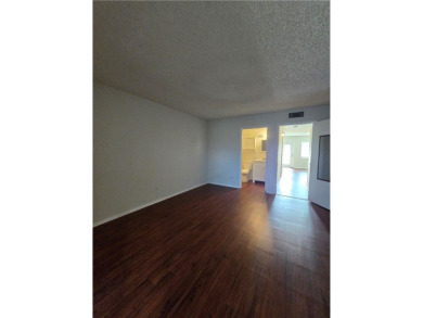 Charming 1BR/1BA First Floor Condo in Vista Royale a 55+ Active on The American Golf Club in Florida - for sale on GolfHomes.com, golf home, golf lot