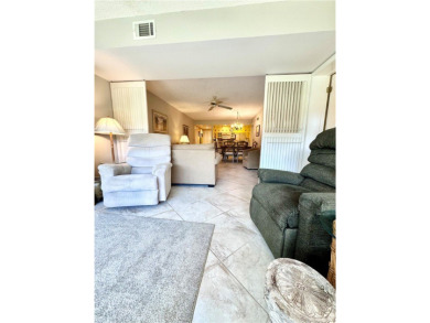 Discover the ultimate retreat in this 1st floor condo, offering on Vista Plantation Golf Club in Florida - for sale on GolfHomes.com, golf home, golf lot