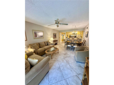 Discover the ultimate retreat in this 1st floor condo, offering on Vista Plantation Golf Club in Florida - for sale on GolfHomes.com, golf home, golf lot