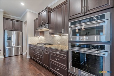 Fabulous Find on this beautiful stucco home with a golf cart on Kissing Tree Golf Club in Texas - for sale on GolfHomes.com, golf home, golf lot