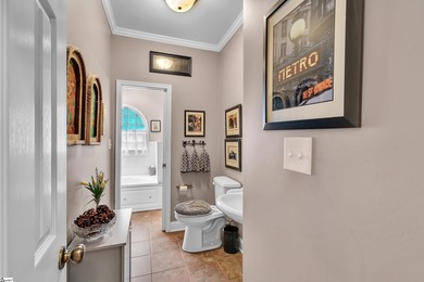 Refined design meets thoughtful functionality in this on Woodfin Ridge Golf Club in South Carolina - for sale on GolfHomes.com, golf home, golf lot