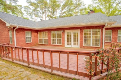 Welcome to this Traditional Red Brick home located on a highly on Hide-A-Way Lake Golf Course in Texas - for sale on GolfHomes.com, golf home, golf lot