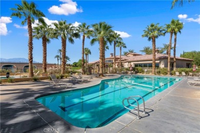 From the moment you drive up to this North Indio masterpiece on Golf Club At Terra Lago in California - for sale on GolfHomes.com, golf home, golf lot