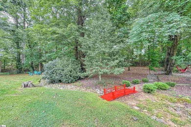 Refined design meets thoughtful functionality in this on Woodfin Ridge Golf Club in South Carolina - for sale on GolfHomes.com, golf home, golf lot