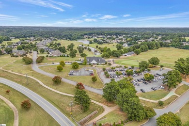 Refined design meets thoughtful functionality in this on Woodfin Ridge Golf Club in South Carolina - for sale on GolfHomes.com, golf home, golf lot
