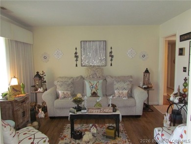 Top-floor waterfront condo featuring 3 bedrooms, 2 bathrooms on Seasons Ridge At Four Seasons in Missouri - for sale on GolfHomes.com, golf home, golf lot