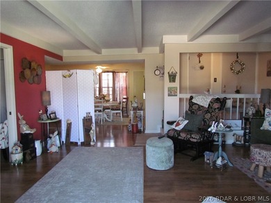 Top-floor waterfront condo featuring 3 bedrooms, 2 bathrooms on Seasons Ridge At Four Seasons in Missouri - for sale on GolfHomes.com, golf home, golf lot