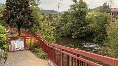 Riverstone Resort & Spa is an upscale riverfront resort located on Gatlinburg Golf Course in Tennessee - for sale on GolfHomes.com, golf home, golf lot