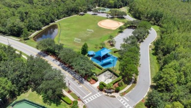 Nestled within the highly desired Stoneybrook East Golfing on Stoneybrook East Golf Club in Florida - for sale on GolfHomes.com, golf home, golf lot