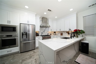 Just off the luscious Mesa Verde golf course is the Cornerstone on Costa Mesa Golf and Country Club in California - for sale on GolfHomes.com, golf home, golf lot