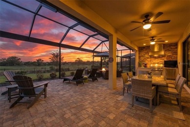 Enjoy expansive golf course views and spectacular western on Lakewood National Golf Club in Florida - for sale on GolfHomes.com, golf home, golf lot