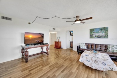 This 6th floor corner condo boasts a spacious open floor plan on Isla Del Sol Yacht and Country Club in Florida - for sale on GolfHomes.com, golf home, golf lot