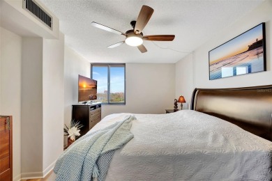 This 6th floor corner condo boasts a spacious open floor plan on Isla Del Sol Yacht and Country Club in Florida - for sale on GolfHomes.com, golf home, golf lot