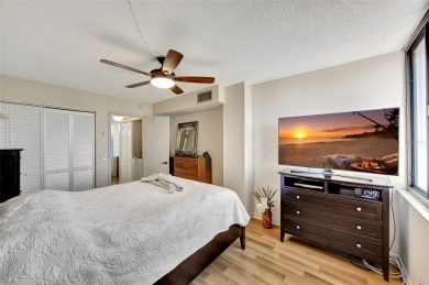 This 6th floor corner condo boasts a spacious open floor plan on Isla Del Sol Yacht and Country Club in Florida - for sale on GolfHomes.com, golf home, golf lot