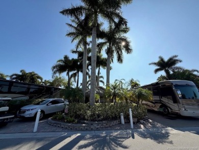 STUNNING LAKE VIEW! Get ready to fall in love with this on  in Florida - for sale on GolfHomes.com, golf home, golf lot