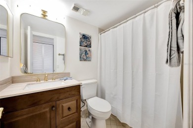 This 6th floor corner condo boasts a spacious open floor plan on Isla Del Sol Yacht and Country Club in Florida - for sale on GolfHomes.com, golf home, golf lot