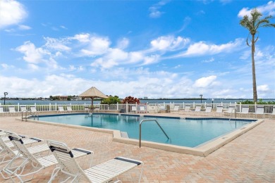 This 6th floor corner condo boasts a spacious open floor plan on Isla Del Sol Yacht and Country Club in Florida - for sale on GolfHomes.com, golf home, golf lot
