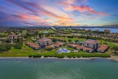 This 6th floor corner condo boasts a spacious open floor plan on Isla Del Sol Yacht and Country Club in Florida - for sale on GolfHomes.com, golf home, golf lot