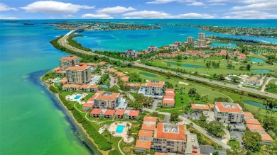 This 6th floor corner condo boasts a spacious open floor plan on Isla Del Sol Yacht and Country Club in Florida - for sale on GolfHomes.com, golf home, golf lot