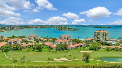 This 6th floor corner condo boasts a spacious open floor plan on Isla Del Sol Yacht and Country Club in Florida - for sale on GolfHomes.com, golf home, golf lot