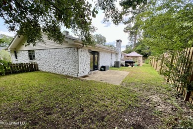 You'll love all of the charm and character that this Diamondhead on Diamondhead Country Club in Mississippi - for sale on GolfHomes.com, golf home, golf lot