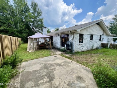 You'll love all of the charm and character that this Diamondhead on Diamondhead Country Club in Mississippi - for sale on GolfHomes.com, golf home, golf lot