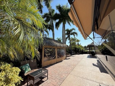 STUNNING LAKE VIEW! Get ready to fall in love with this on Motorcoach Resort Golf Course in Florida - for sale on GolfHomes.com, golf home, golf lot