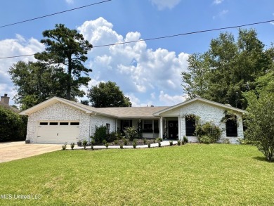 You'll love all of the charm and character that this Diamondhead on Diamondhead Country Club in Mississippi - for sale on GolfHomes.com, golf home, golf lot