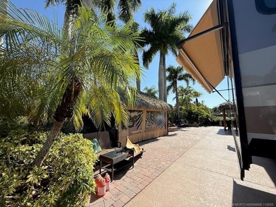 STUNNING LAKE VIEW! Get ready to fall in love with this on Motorcoach Resort Golf Course in Florida - for sale on GolfHomes.com, golf home, golf lot