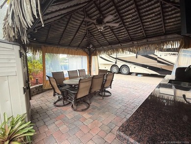 STUNNING LAKE VIEW! Get ready to fall in love with this on Motorcoach Resort Golf Course in Florida - for sale on GolfHomes.com, golf home, golf lot