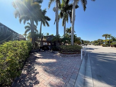 STUNNING LAKE VIEW! Get ready to fall in love with this on Motorcoach Resort Golf Course in Florida - for sale on GolfHomes.com, golf home, golf lot