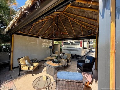 STUNNING LAKE VIEW! Get ready to fall in love with this on Motorcoach Resort Golf Course in Florida - for sale on GolfHomes.com, golf home, golf lot