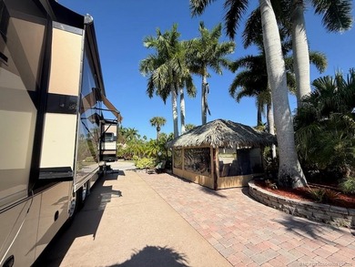 STUNNING LAKE VIEW! Get ready to fall in love with this on Motorcoach Resort Golf Course in Florida - for sale on GolfHomes.com, golf home, golf lot