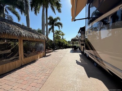 STUNNING LAKE VIEW! Get ready to fall in love with this on Motorcoach Resort Golf Course in Florida - for sale on GolfHomes.com, golf home, golf lot