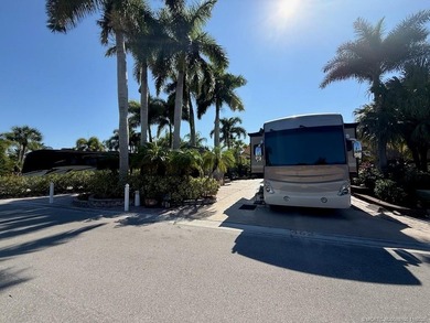 STUNNING LAKE VIEW! Get ready to fall in love with this on Motorcoach Resort Golf Course in Florida - for sale on GolfHomes.com, golf home, golf lot