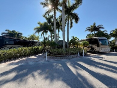 STUNNING LAKE VIEW! Get ready to fall in love with this on Motorcoach Resort Golf Course in Florida - for sale on GolfHomes.com, golf home, golf lot