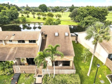 The Escape at Arrowhead is a wonderful community in Davie on Davie Golf Club in Florida - for sale on GolfHomes.com, golf home, golf lot