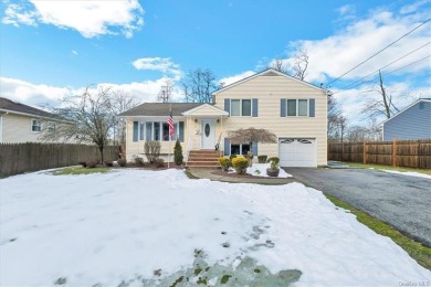 WOW, Welcome Home! Come take a look at this beautiful split on Mc Cann Memorial Golf Course in New York - for sale on GolfHomes.com, golf home, golf lot