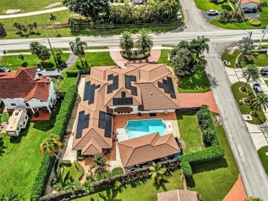 This beautiful single-family home plus guest house in THE FALLS on Briar Bay Golf Course in Florida - for sale on GolfHomes.com, golf home, golf lot