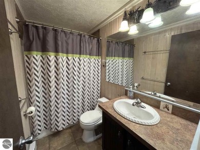 Hello Shanty Creek! Pack your bag, come on up, play and stay on Shanty Creek Golf Course in Michigan - for sale on GolfHomes.com, golf home, golf lot