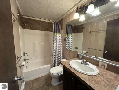 Hello Shanty Creek! Pack your bag, come on up, play and stay on Shanty Creek Golf Course in Michigan - for sale on GolfHomes.com, golf home, golf lot