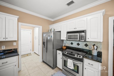 Welcome to this beautifully maintained 3-bedroom, 2-bath home on Peninsula Golf and Racquet Club in Alabama - for sale on GolfHomes.com, golf home, golf lot