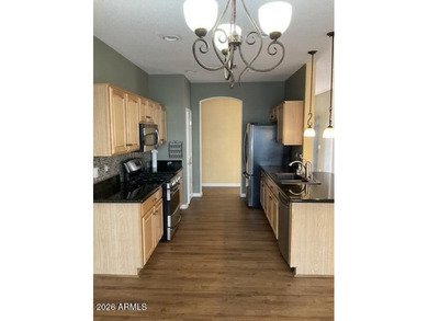 Enjoy Resort-Style Living in the Sought-After Golf Course on Lone Tree Golf Club in Arizona - for sale on GolfHomes.com, golf home, golf lot