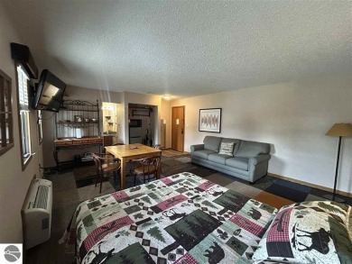 Hello Shanty Creek! Pack your bags and head up north to play and on Schuss Mountain Golf Club in Michigan - for sale on GolfHomes.com, golf home, golf lot