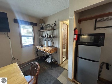 Hello Shanty Creek! Pack your bags and head up north to play and on Schuss Mountain Golf Club in Michigan - for sale on GolfHomes.com, golf home, golf lot